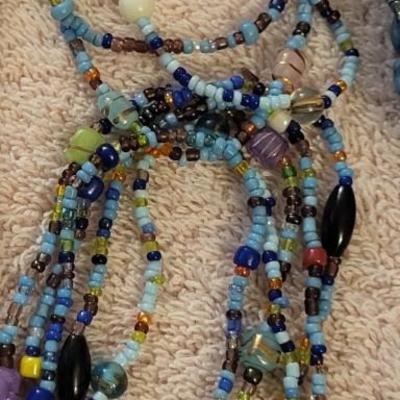 MULTI STRAND BEADED BRACELETS
