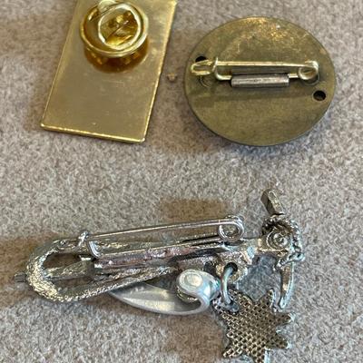 Pins and necklace from around the world