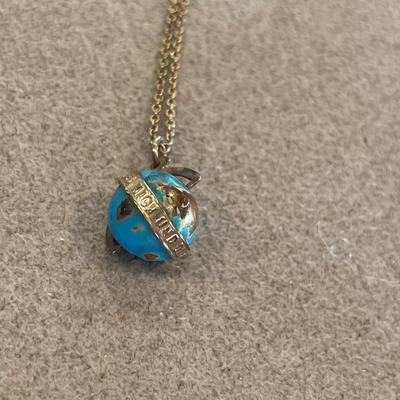 Pins and necklace from around the world