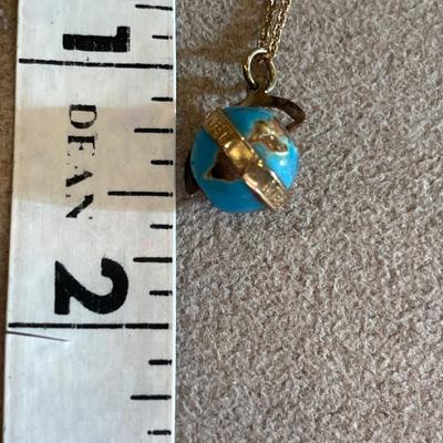 Pins and necklace from around the world