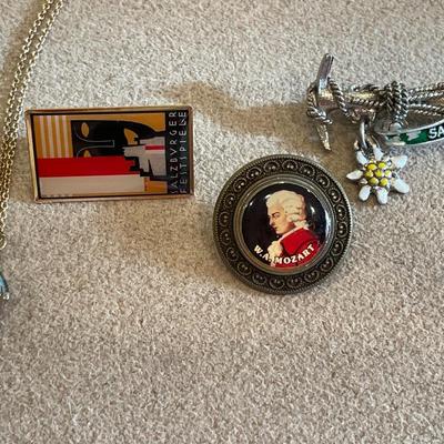 Pins and necklace from around the world