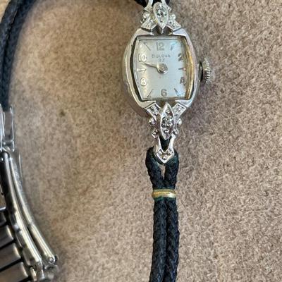 Ladies Bulova and men’s Timex watch