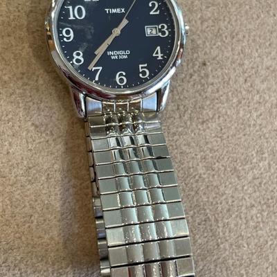 Ladies Bulova and men’s Timex watch