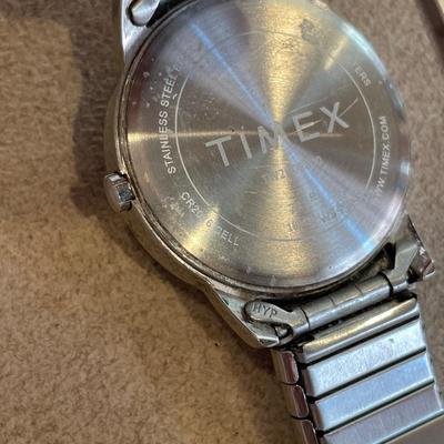 Ladies Bulova and men’s Timex watch