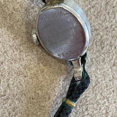 Ladies Bulova and men’s Timex watch