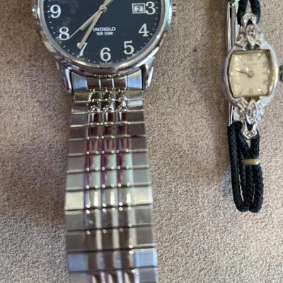 Ladies Bulova and men’s Timex watch