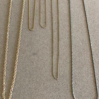 Silver and gold tone chains