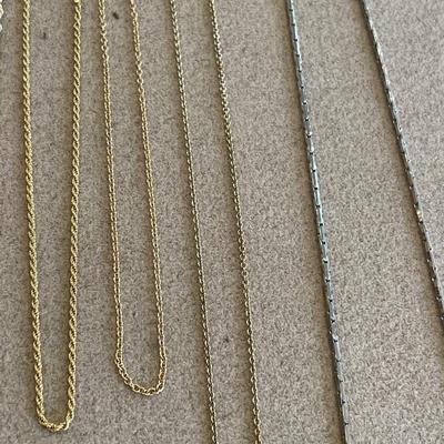 Silver and gold tone chains