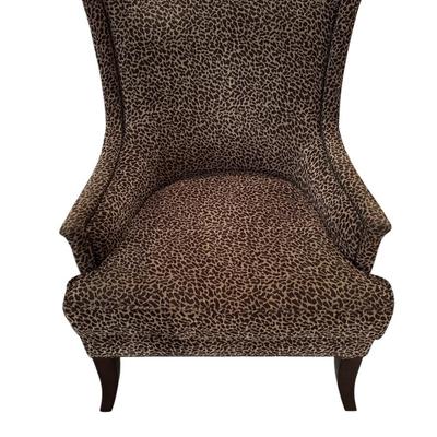Pair of high back animal printed chairs