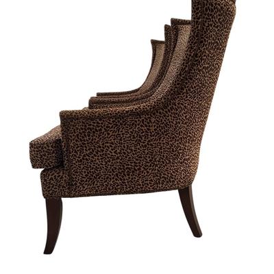 Pair of high back animal printed chairs