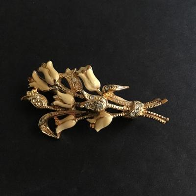 Gold tone brooch with enameled flowers