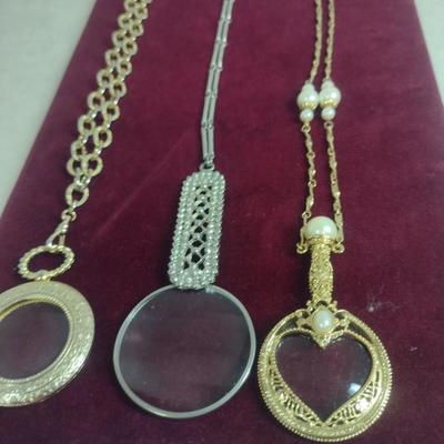 Collection of Magnifying Glass Pendant Necklaces (#16)