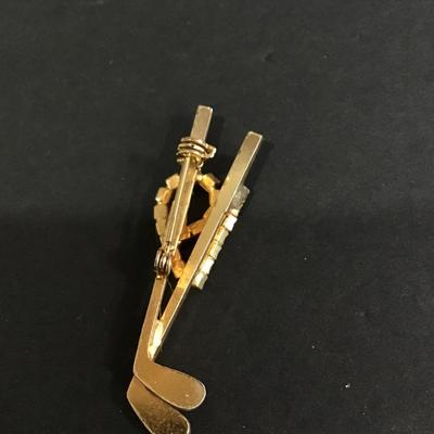 Cute gold tone golf club brooch