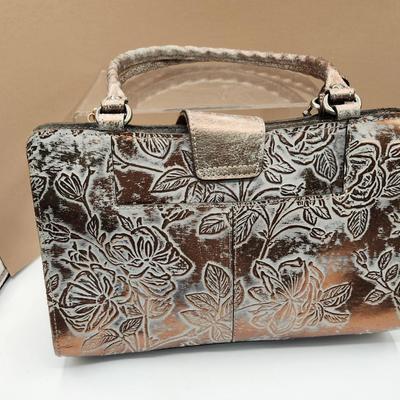 Sale Photo Thumbnail #122: Light grey, dust bag included,  13 x 8 inches 
New
Retails at $229