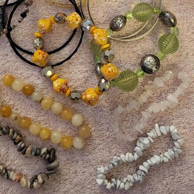 A LARGE ASSORTMENT OF BRACELETS