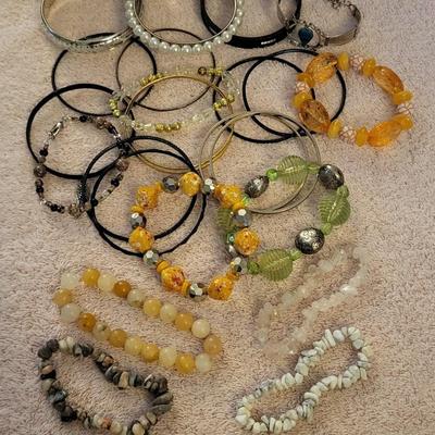A LARGE ASSORTMENT OF BRACELETS