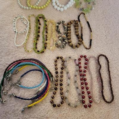 A LARGE ASSORTMENT OF BRACELETS