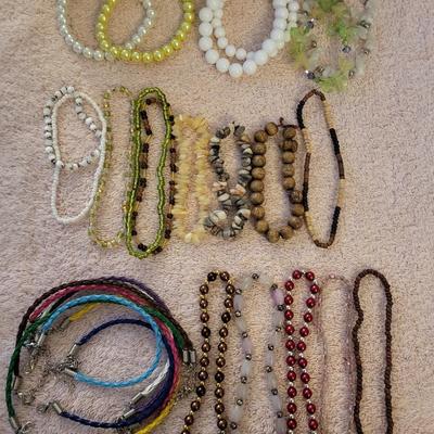 A LARGE ASSORTMENT OF BRACELETS