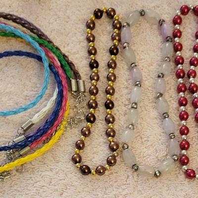 A LARGE ASSORTMENT OF BRACELETS
