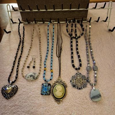 NECKLACES AND A HOLDER