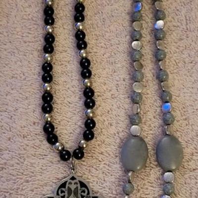 NECKLACES AND A HOLDER