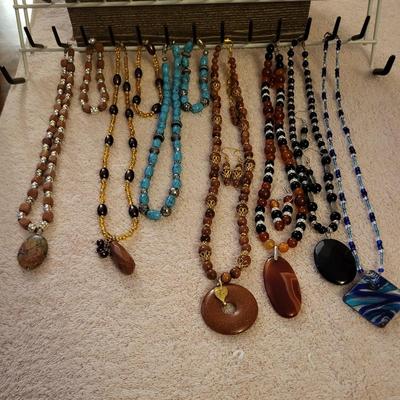 BEADED NECKLACES WITH A HOLDER
