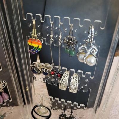 EARRINGS AND A HOLDER