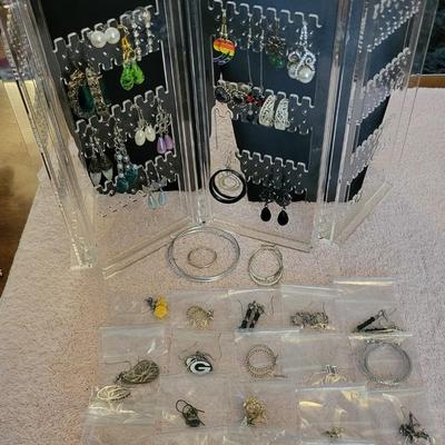 EARRINGS AND A HOLDER