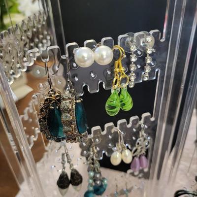 EARRINGS AND A HOLDER