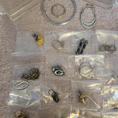 EARRINGS AND A HOLDER