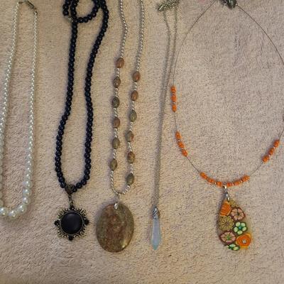 SEVERAL NECKLACES
