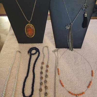 SEVERAL NECKLACES