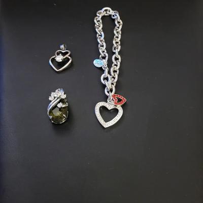 2 PENDANTS AND A BRACELET