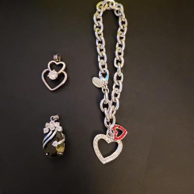 2 PENDANTS AND A BRACELET