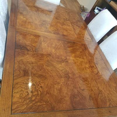 Sale Photo Thumbnail #114: Incredible Dining room set.  Fabulous table with 10 chairs. 2 leaves, huge lighted China cabinet. 2 lighted shelving units.
Pristine condition.   Over $60,000 new.