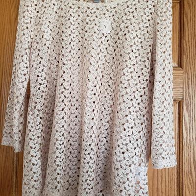 Sale Photo Thumbnail #126: Beige, lacy pattern, Size Large top with 3/4 length sleeves. Polyester. Machine wash cold. 21.5" across chest. 26" long. Sleeves 18 3/4" long. Like new condition.