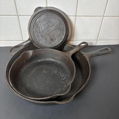 Lot 217: Three Griswold Cast Iron Pans