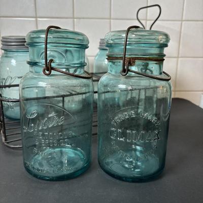 Lot 221: Vintage Washboards, Apple Cider Jug (Tin Wrapped in Wood), Mason Jars in Metal Caddy