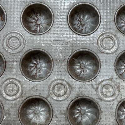 Lot 222: Vintage Ekco Commercial Muffin Pan, Cast Iron Pot, Tin Pans, Grater and More
