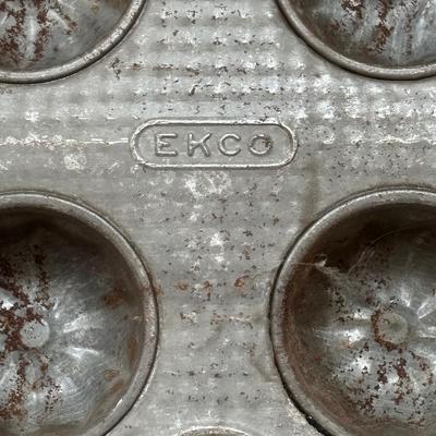 Lot 222: Vintage Ekco Commercial Muffin Pan, Cast Iron Pot, Tin Pans, Grater and More