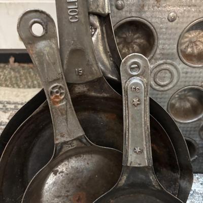 Lot 222: Vintage Ekco Commercial Muffin Pan, Cast Iron Pot, Tin Pans, Grater and More