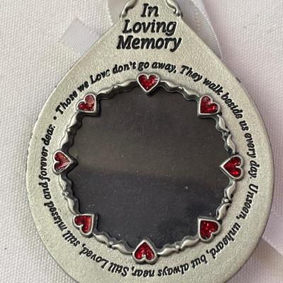 Two crown keychains and one memory ornament