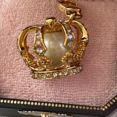 Two crown keychains and one memory ornament