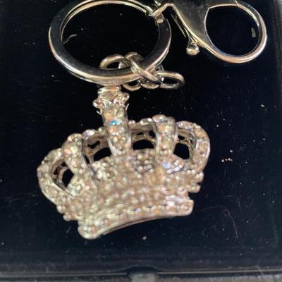 Two crown keychains and one memory ornament