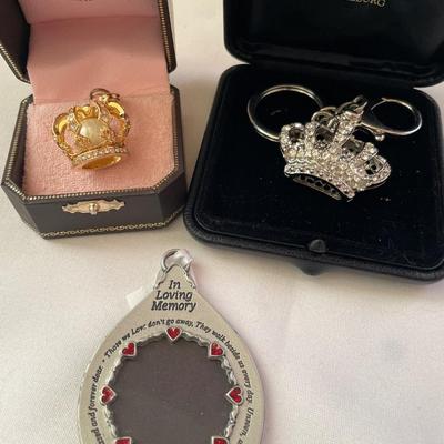 Two crown keychains and one memory ornament