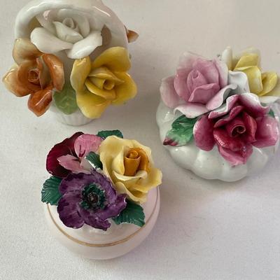 Three small porcelain floral bouquets