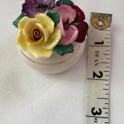 Three small porcelain floral bouquets