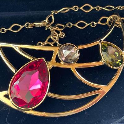 Swarovski large gold tone necklace with red and green crystals