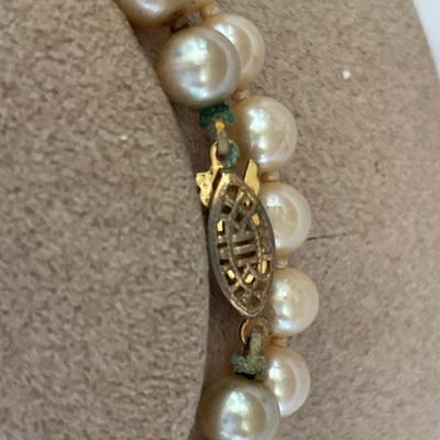 Faux pearls and stunning brooch