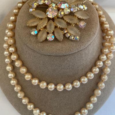 Faux pearls and stunning brooch